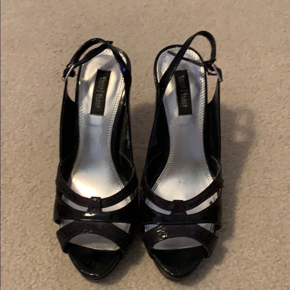 Black Patent Leather Slingback Pumps.